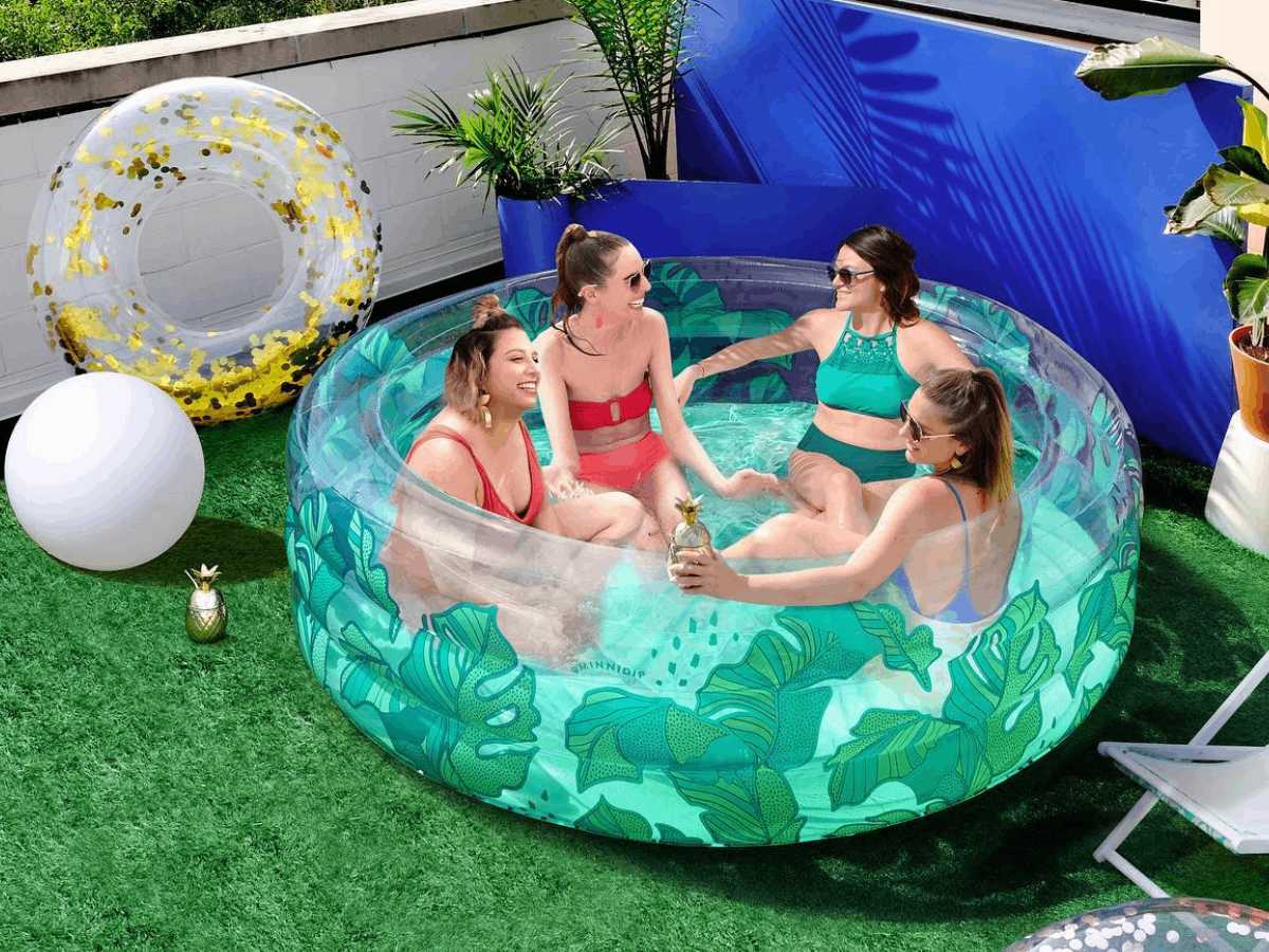 Small inflatable pool in a backyard during summer